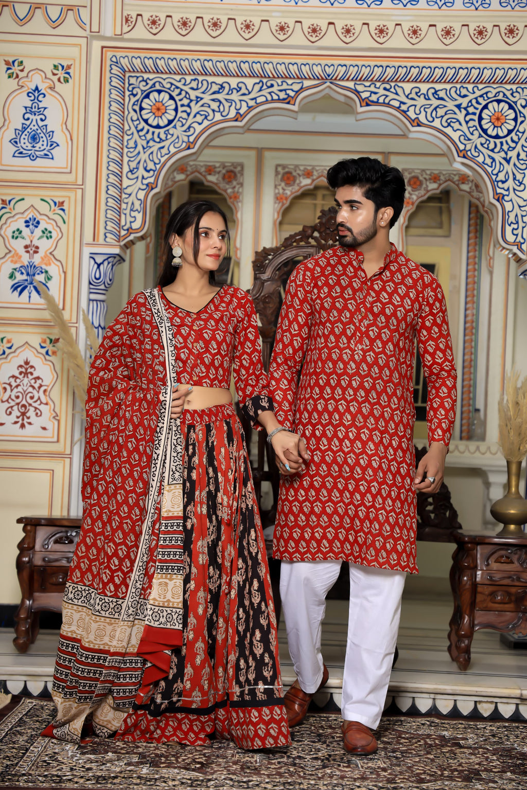 Majestic Red Bagru Hand Block Printed Couple Set – Vibrant Chaniya Choli with Multicolored Skirt & Elegant Mulmul Dupatta | Matching Regal Men’s Kurta with Classic White Payzama