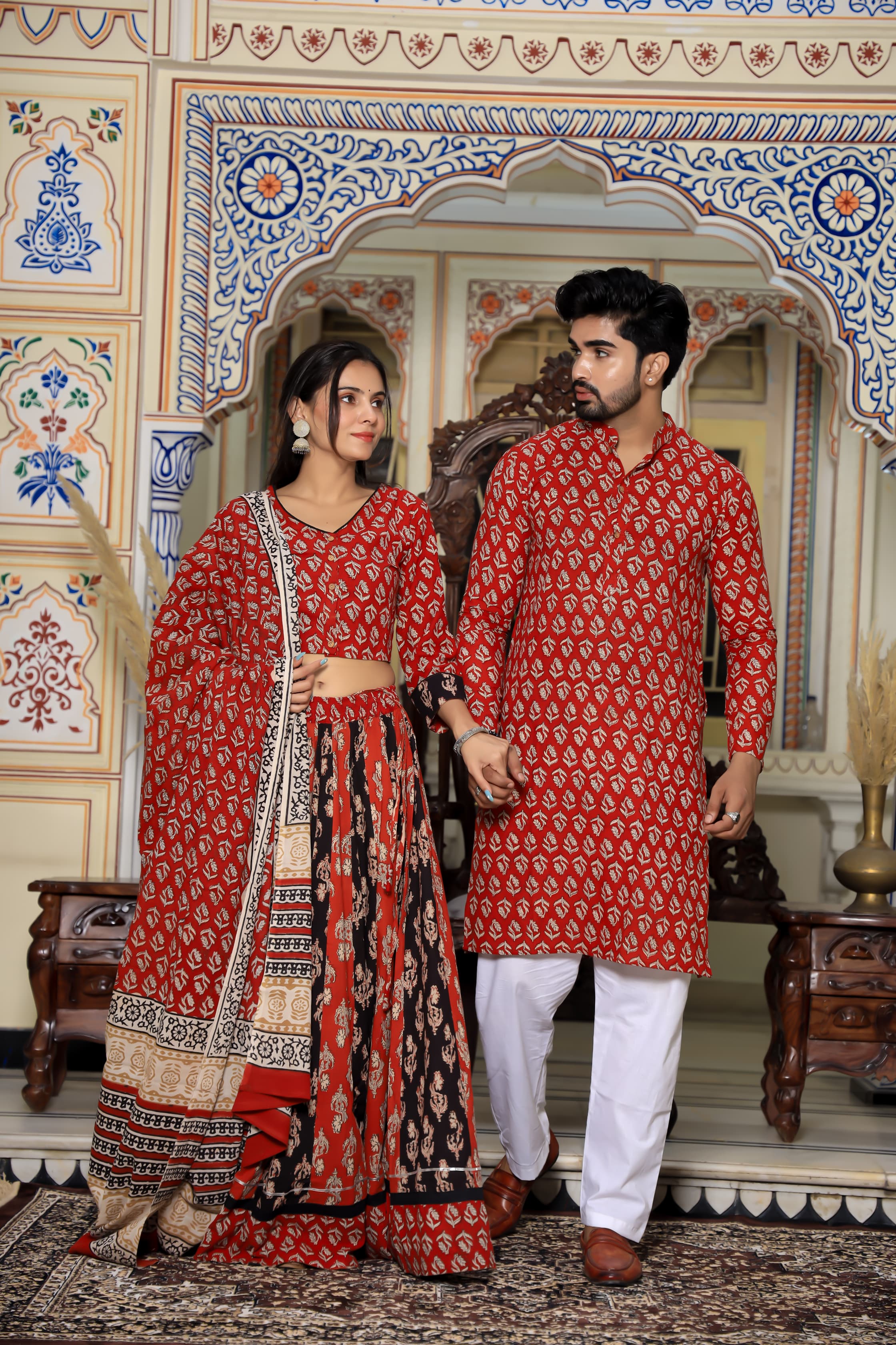 Majestic Red Bagru Hand Block Printed Couple Set – Vibrant Chaniya Choli with Multicolored Skirt & Elegant Mulmul Dupatta | Matching Regal Men’s Kurta with Classic White Payzama