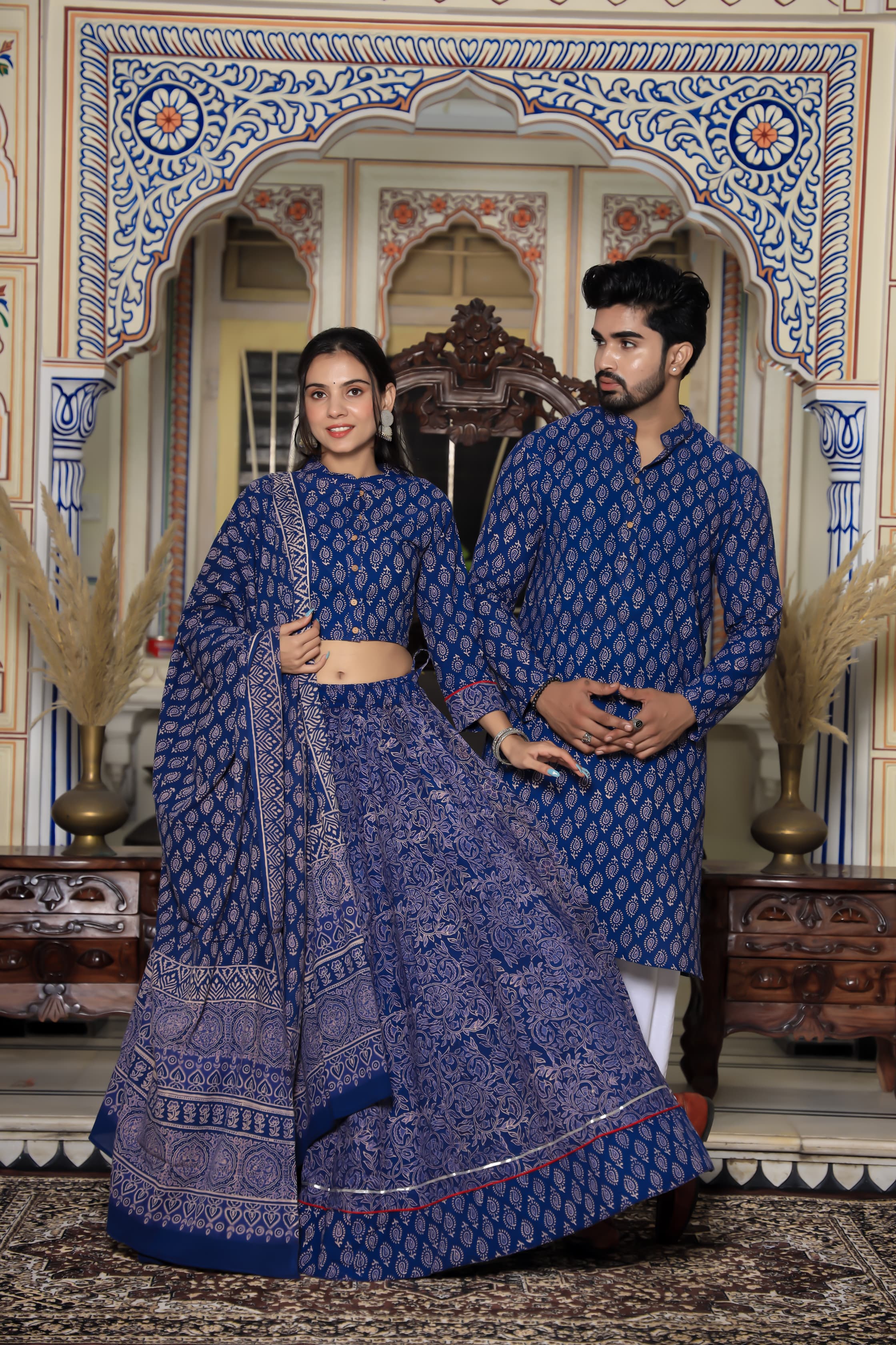 Majestic Blue Bagru Hand Leaf Printed Couple Set – Vibrant Chaniya Choli with Vibrant Skirt & Elegant Mulmul Dupatta | Matching Regal Men’s Kurta with Classic White Payzama