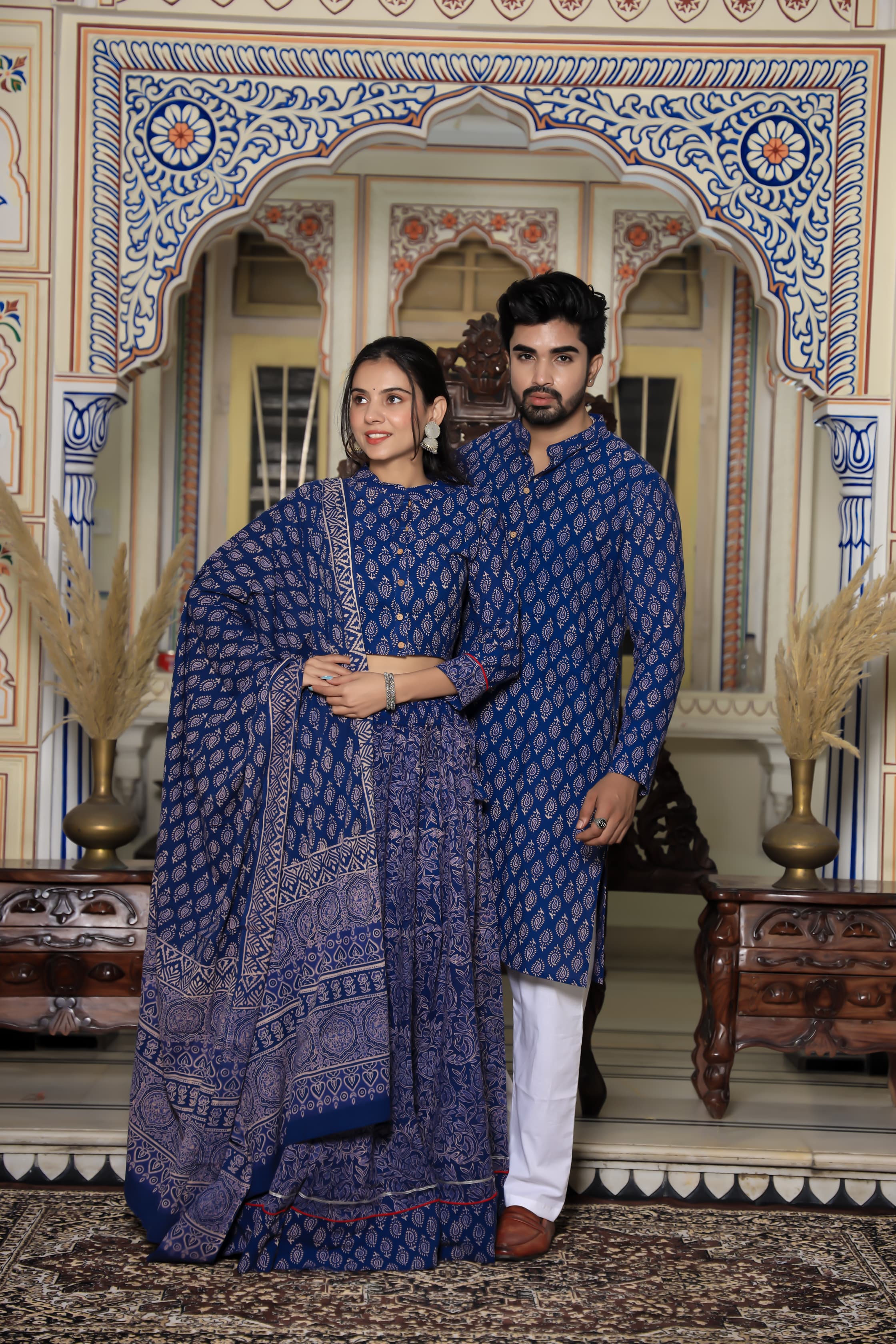 Majestic Blue Bagru Hand Leaf Printed Couple Set – Vibrant Chaniya Choli with Vibrant Skirt & Elegant Mulmul Dupatta | Matching Regal Men’s Kurta with Classic White Payzama